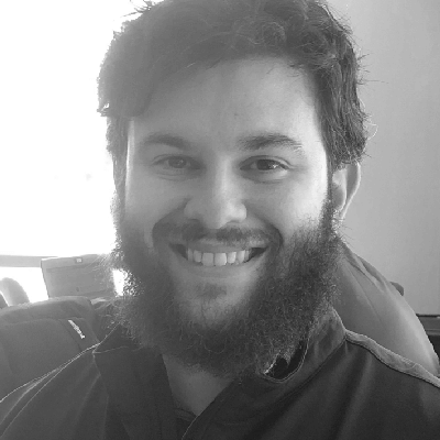 Young bearded man smiling